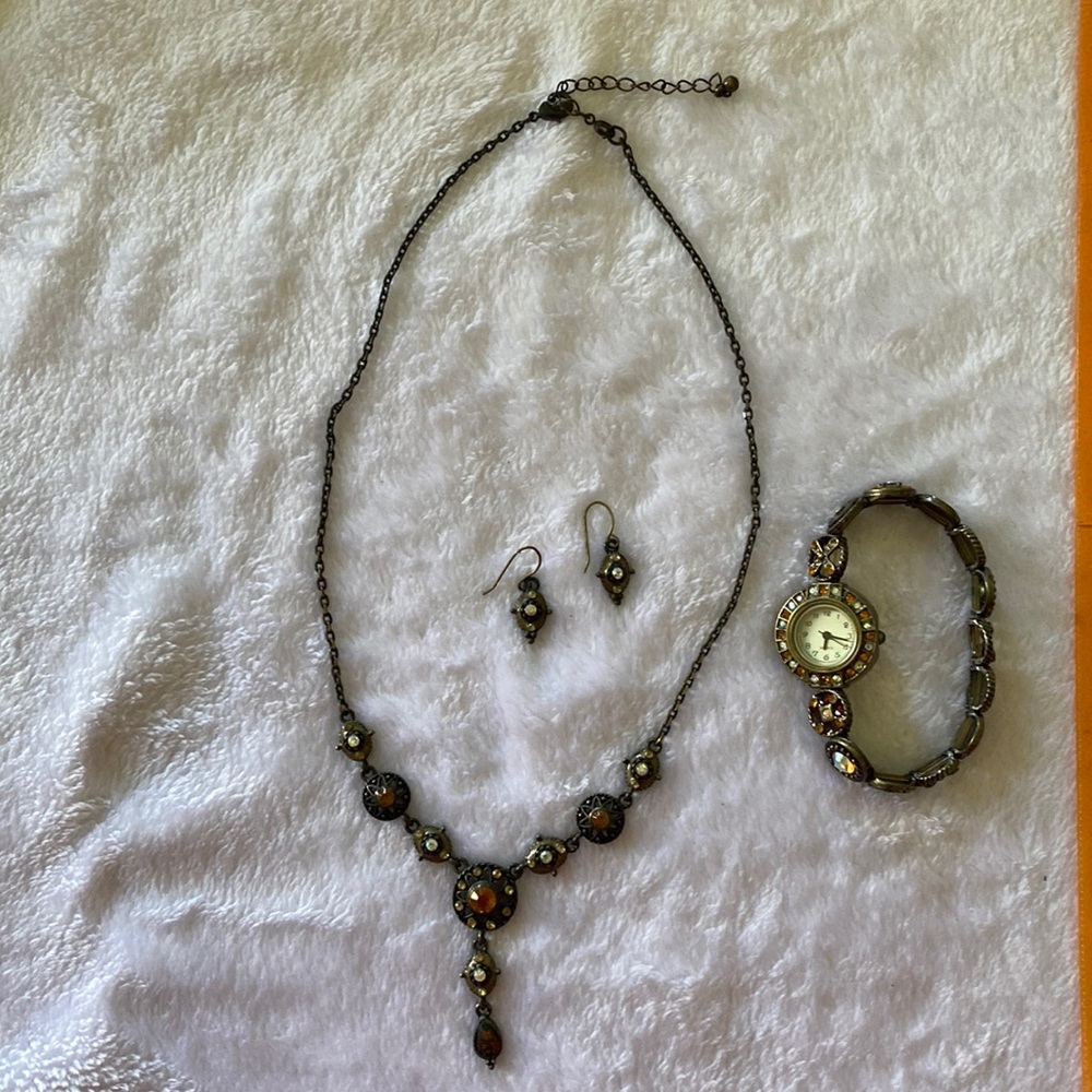 Brown necklace, earring and bracelet watch set.